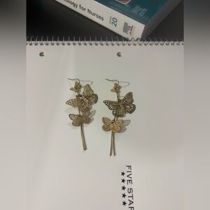 Gold butterfly dangle earrings